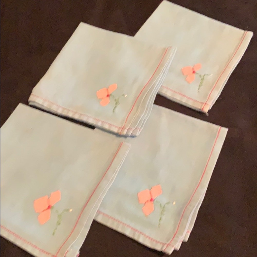 Four piece vintage blue embroidered linen napkins